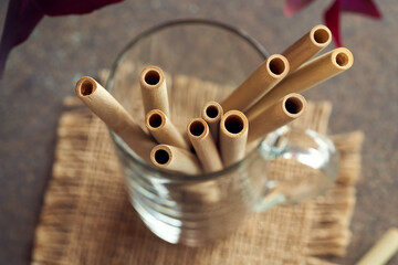 Several bamboo straws in a glass - ecology concept