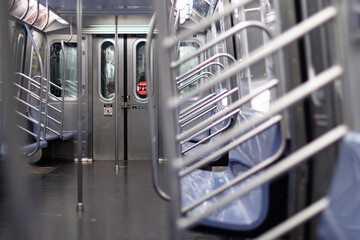 Inside a subway cart, empty train