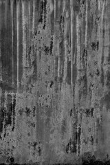 Grungy slice stone facade of worn wall. Uneven aged splitting plastering of shabby cement ground slab. Broken rustic chipped bumpy grunge loft, vintage rough coating dirty block for 3D retro design