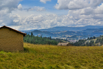 Fototapeta na wymiar Boyaca colombia, looking at mountain range and farm 