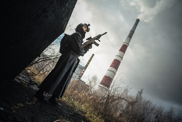 Post apocalypse soldier in a abandoned area concept.