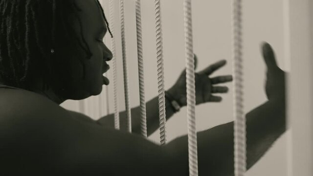 African american black man in prison protesting. High quality 4k footage
