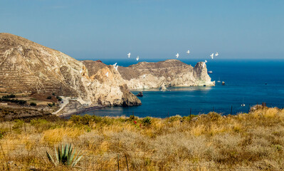 Famous White beach on island of Santorini, Greece. Seen from distance. Beautiful nature landscape,...
