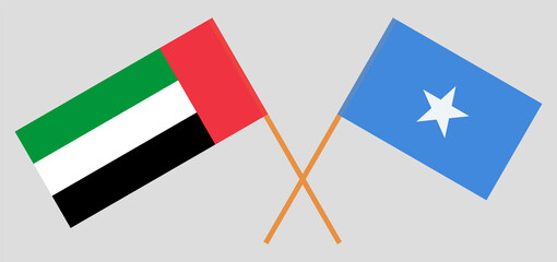 Crossed flags of the United Arab Emirates and Somalia. Official colors. Correct proportion