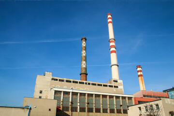 The old heating plant with three chimneys. 
