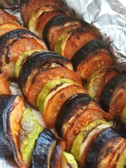 Baked vegetables. Courgettes, tomatoes and eggplant Vegetarian