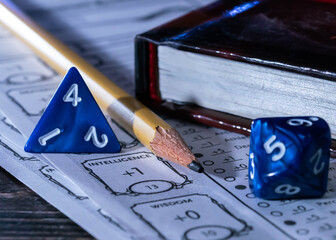 Table top role playing game dice, pencil and player sheet