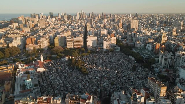 Aerial establishing shot of La Recoleta Cemetery and downtown Buenos Aires on background