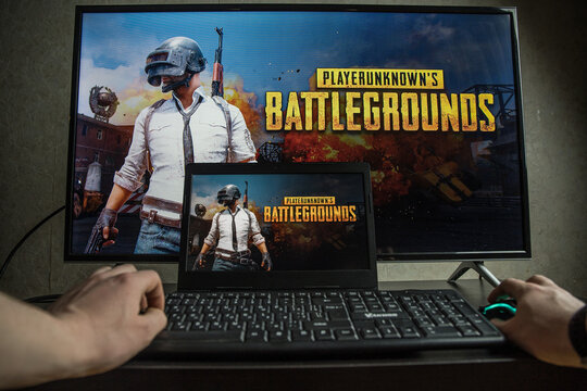 PC gaming. Playing PlayerUnknown's Battlegrounds video game on computer. PUBG