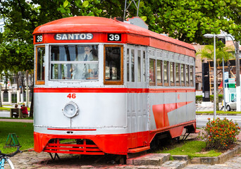 Fototapeta na wymiar Tourist tram restored that makes walks through the historical center of the city of Santos, Sao Paulo.