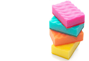 Obraz na płótnie Canvas Multi-colored scouring pads for washing dishes. utensils. concept of cleaning and sanitation.