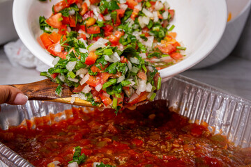 Front view serving chopped salad over an aluminum bowl, Healthy food concept.