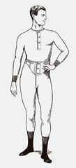 Athletic young man from the early 20th century wearing long slim fit underwear and socks