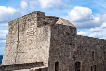 Fototapeta na wymiar Stone walls and architecture in El Morro Fort, Havana, Cuba
