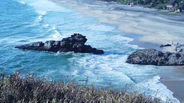 High angle view of the coast of Punta Cometa, Mazunte, Oaxaca, Mexico, slow motion static wide shot