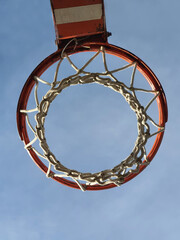 basketball hoop on blue sky background