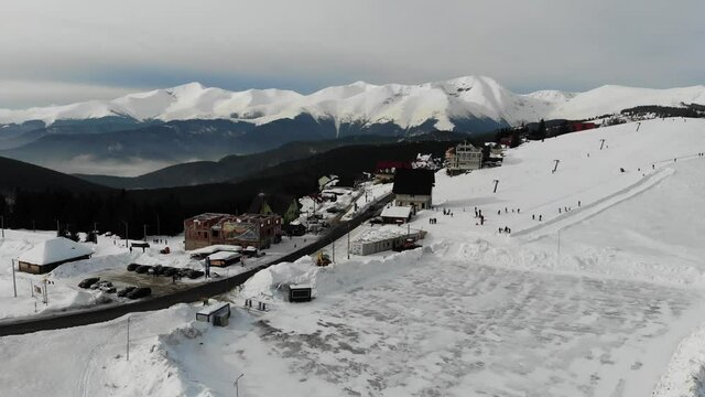 Beautiful aerial view of Ranca resort covered with snow in the Carpathian mountains