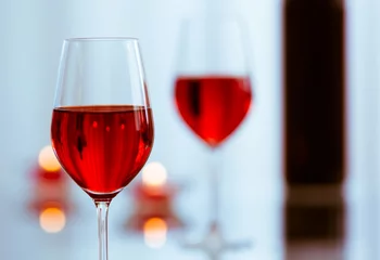 Fotobehang wine glasses on restaurant table  © kieferpix