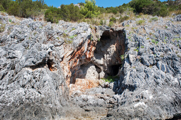 The wonderful spectacle that nature offers us due to marine erosion and weathering over centuries. Cilento coast, Italy.