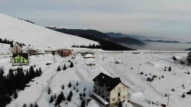 Aerial view of Ranca resort in the Parang Mountains on a cold winter day
