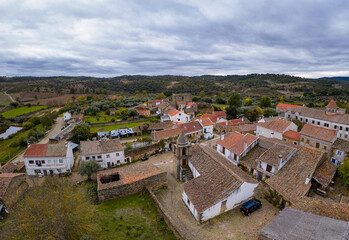 Fototapeta na wymiar Drone aerial view of Idanha a velha historic village and landscape with Monsanto on the background, in Portugal