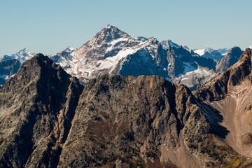 Jagged and rough north cascades mountain range with snow-capped peaks