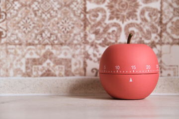 Kitchen timer shaped like a apple on kitchen