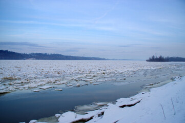 Ice floe on river in winter season