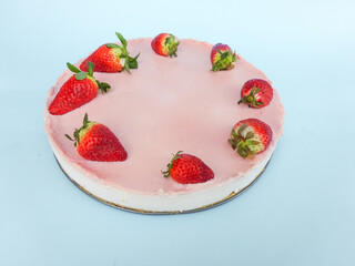 Creamy mascarpone cheese cake with strawberry . Piece of New York Cheesecake. Close up. Christmas dessert. Healthy food. Flat lay creative food concept.