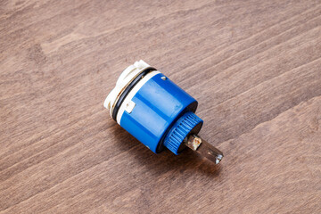 old clogged broken faucet cartridge. handyman repair leaky faucet. water tap fix service concept