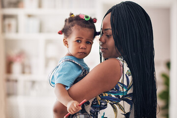 portrait of african american mother and toddler baby girl at home - 416642203