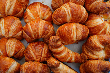 Freshly baked French croissants at a bakery