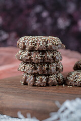 Sesame caramel cookies on a wooden board