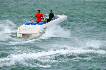 



Small high-end sporty run-about motor boat.

