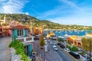 Wallpaper murals Villefranche-sur-Mer, French Riviera Scenic view of the colorful town, bay and marina of Villefranche Sur Mer, on the French Riviera coast of Southern France.