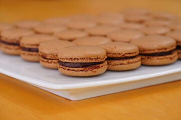 French macaron cookies filled with chocolate ganache cream