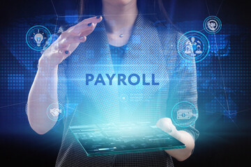 Business, Technology, Internet and network concept. Young businessman working on a virtual screen of the future and sees the inscription: Payroll