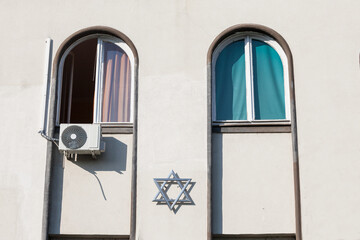 Magen David, the traditional jewish star, on display on the administrative building of the Belgrade...