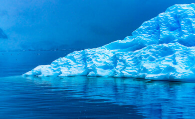 Snowing Floating Blue Iceberg Reflection Paradise Bay Antarctica