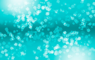 Beautiful bokeh Background on blue colour with four leaf clovers pattern.