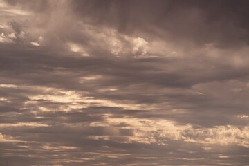 This photograph features a sky filled with rain clouds.