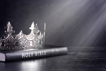 Holy Bible and a Kings Crown on a Dark Moody Background
