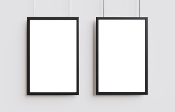 Two white poster with black frame mockup on wall. 3d illustration.
