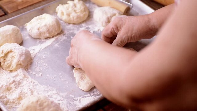 Panzerotti and calzone folding and sealing process homemade by senior chef