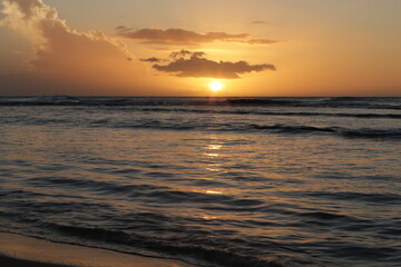 Fototapeta na wymiar Kauai beach at sunset
