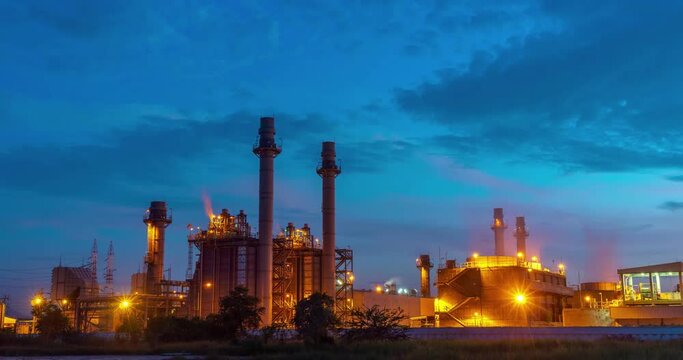 Time lapse of Industrial area, electricity power supply substation during and petrochemical. oil manufacturing products. power electric plant at night