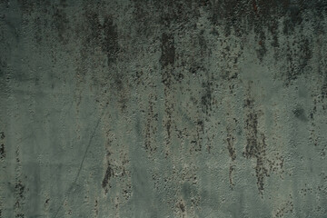 Multicolored background: rusty metal surface with peeling and cracking paint Natural defects Scratches, cracks, cracks, chips, dust, roughness, abrasion. Template for design and background.Copy space