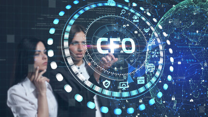Business, Technology, Internet and network concept. Young businessman working on a virtual screen of the future and sees the inscription: CFO