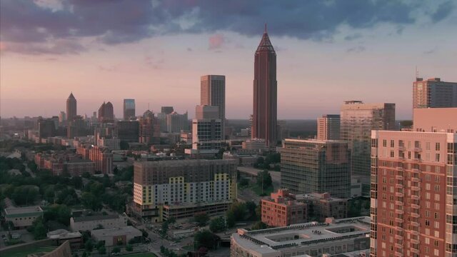 Aerial: Atlanta City Skyline, Centennial Olympic Park & World Of Coca Cola Museum. Georgia, USA