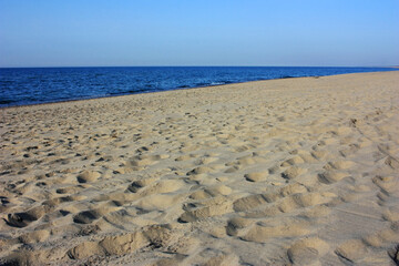 Fototapeta na wymiar Sandy shore of the Baltic Sea